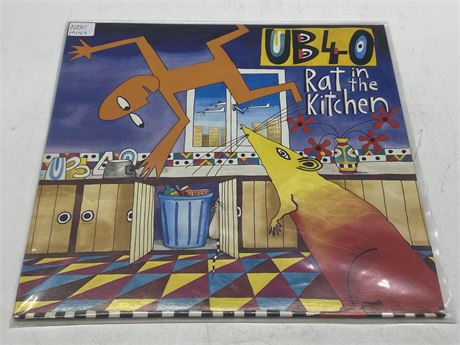 UB40 RAT IN THE KITCHEN - NEAR MINT (NM)