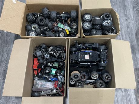 4 LARGE BOXES FULL OF RC CAR / TRUCK TIRES, BASES & PARTS