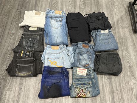 12 PAIRS MENS PANTS - ASSORTED SIZES - TRUE RELIGIONS MISSING ONE BUTTON