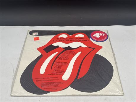 SEALED OLD STOCK - THE ROLLING STONES - SUCKING IN THE SEVENTIES