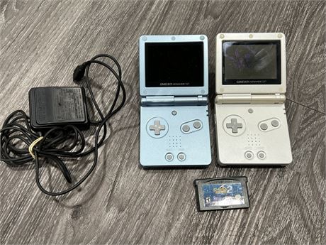 2 GAMEBOY ADVANCE SP’S - 1 NEEDS WORK - COMES W/GAME & CHARGER
