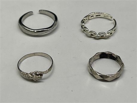 LOT OF 4 SMALLER SIZE STERLING RINGS