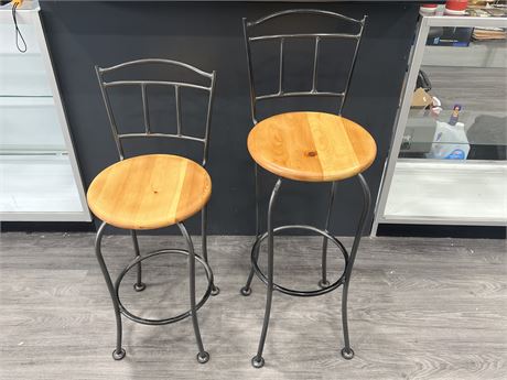2 HEAVY WROUGHT IRON CHAIRS - TALLER ONE IS 40”