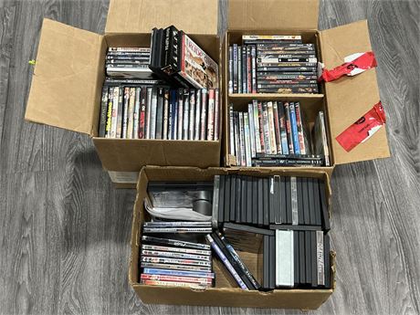 3 BOXES OF DVDS