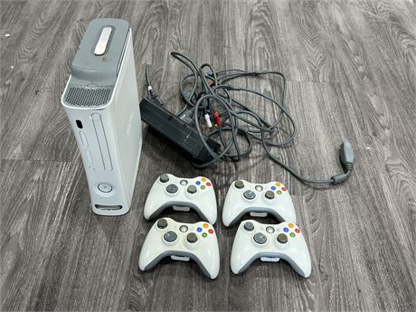 XBOX 360 W/CORDS & CONTROLLERS - TURNS ON