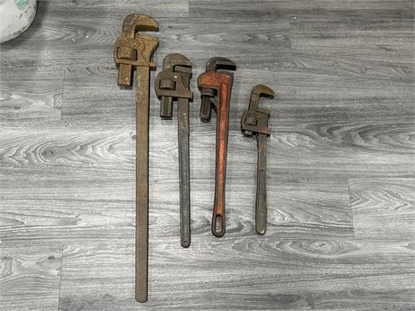 4 LARGE HEAVY DUTY WRENCHES - LARGEST IS 34” LONG