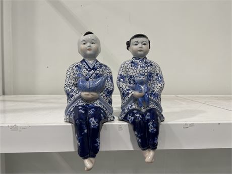 2 HAND PAINTED PORCELAIN SITTING FIGURES - 11”