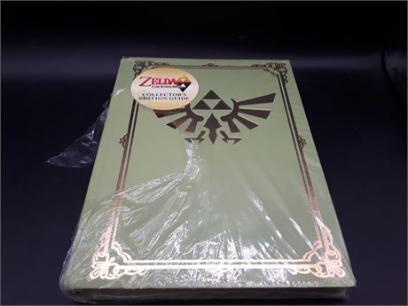 RARE - ZELDA HARDCOVER GUIDE BOOK W/POSTER - MINT CONDITION