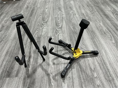 2 GUITAR STANDS - ONE IS HERCULES BRAND