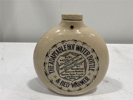 EARLY 1900s ADVERTISING HOT WATER BOTTLE (7.5” tall)