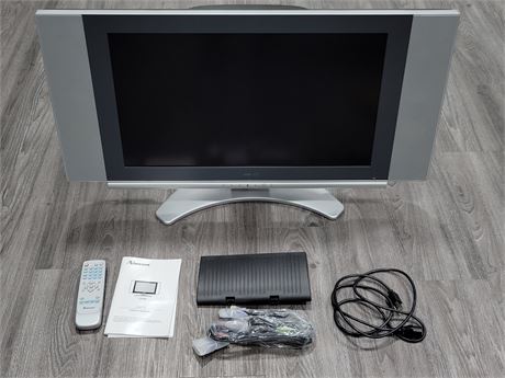NORCENT LCD TV (Box with manual cords + remote)