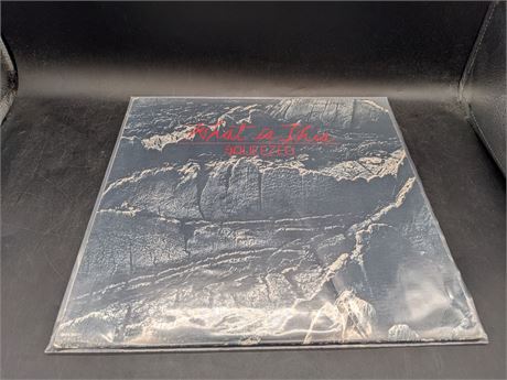 RARE - WHAT IS THIS - SQUEEZED (E) EXCELLENT CONDITION - VINYL