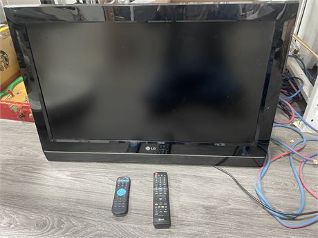 32” LG TV WITH REMOTES (LIGHT TURNS ON)