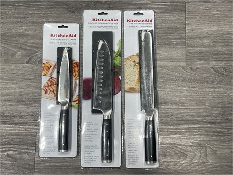 3 SEALED NEW KITCHEN AID KNIVES - 5.5” 7” 8”