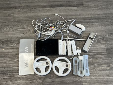 LARGE LOT OF NINTENDO WII CONSOLE, CORDS, CONTROLLERS & ECT