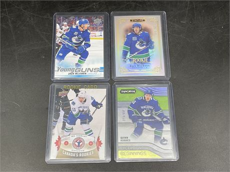 4 CANUCKS CARDS (MOSTLY ROOKIES)