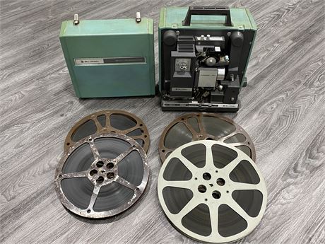 BELL & HOWELL 16MM FILM/SOUND PROJECTOR WITH 4 REELS OF FILM