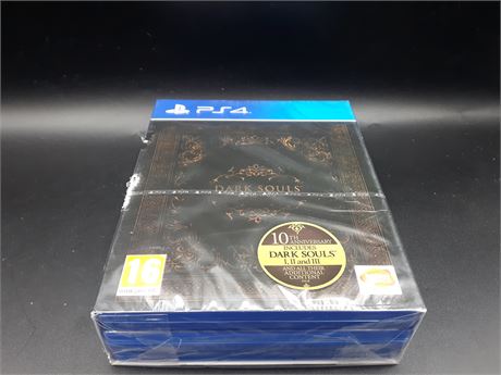 SEALED - DARK SOULS TRILOGY - PS4 (OUTER PACKAGING HAS SOME TEARS)
