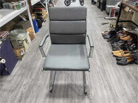 AS NEW OFFICE CHAIR (23”x20”x38”)
