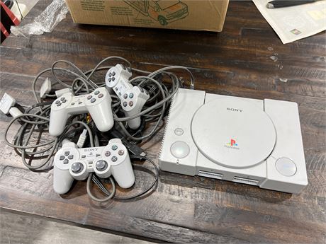PLAYSTATION ONE CONSOLE W/CONTROLLERS & CORDS
