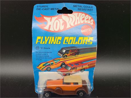 1977 VINTAGE (NEW)HOTWHEELS FLYING COLOR 31 DOOZIE (Mint in box)