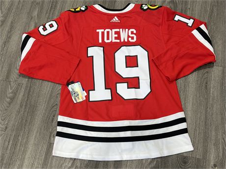 JONATHAN TOEWS CHICAGO BLACKHAWKS JERSEY NEW WITH TAGS - SIZE 52