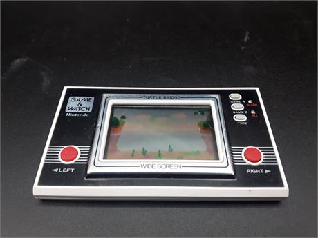 TURTLE BRIDGE (GAME & WATCH) - MISSING BATTERY COVER