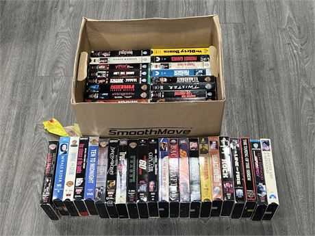 BOX OF VINTAGE VHS TAPES