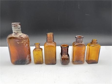 6 ASSORTED SIZE AMBER BOTTLES 5” EXCAVATED FROM 237 E.PENDER