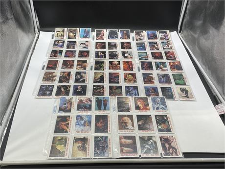 8 SHEETS OF MISC 80’S MOVIE CARDS INCL: ALIEN, GHOSTBUSTERS, PREDATOR, ETC
