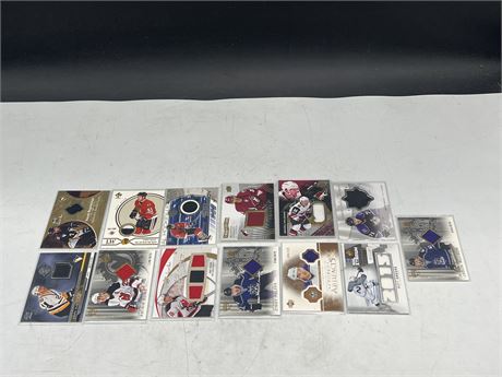 13 NUMBERED JERSEY CARDS