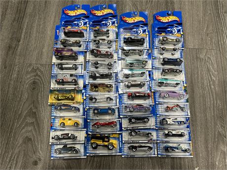 LOT OF 40 HOT WHEELS IN PACKAGES - ALL DATED 1997 TO 2000