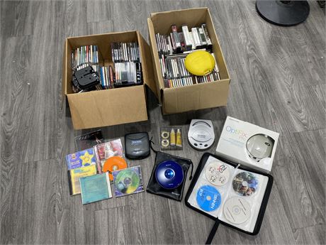 2 BOXES OF CDS, CD PLAYERS & CD CLEANERS