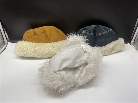 LOT OF 3 WINTER HATS INCL: 2 SHEEPSKIN & TRAPPER HAT BY CHOKA