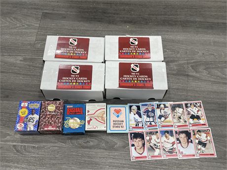 4 1990-91 WHL CARD BOXES W/ ASSORTED SPORT CARD SETS INCK: SEALED CFL 110 CARD