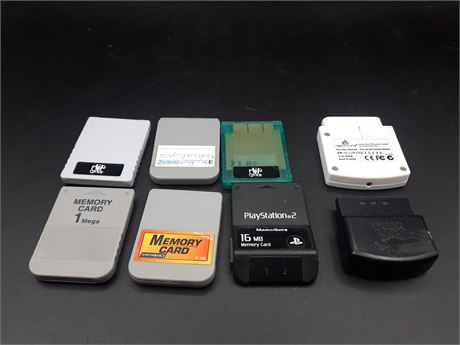 COLLECTION OF MEMORY CARDS / GUITAR HERO ADAPTERS - PLAYSTATION