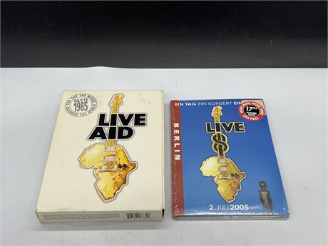 2 LIVE AID CONCERT DVDS - 1 SEALED - OTHER EXCELLENT COND.