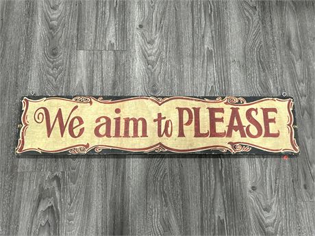 VINTAGE HAND PAINTED “WE AIM TO PLEASE” WOODEN SIGN - 36”x8”