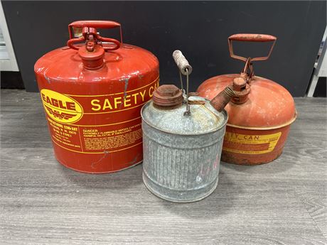 3 VINTAGE GAS CANS - LARGEST IS 14”