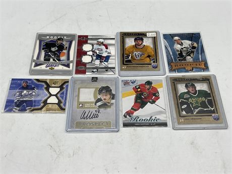 8 NHL ROOKIE CARDS INCLUDING AUTOS & JERSEY CARDS