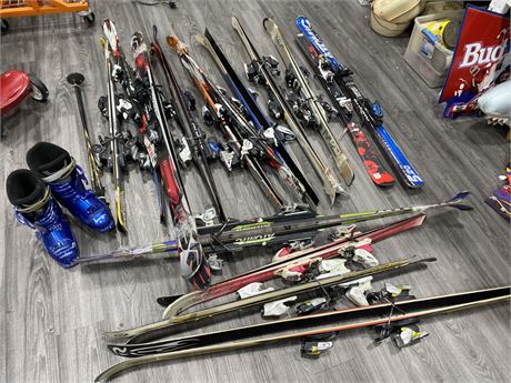 LARGE LOT OF SKIS & PAIR OF BOOTS