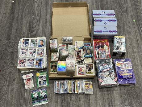 LARGE LOT OF SPORTS CARDS INCLUDING SOME SEALED PACKS