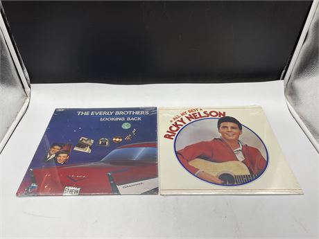 2 SEALED OLD STOCK RECORDS