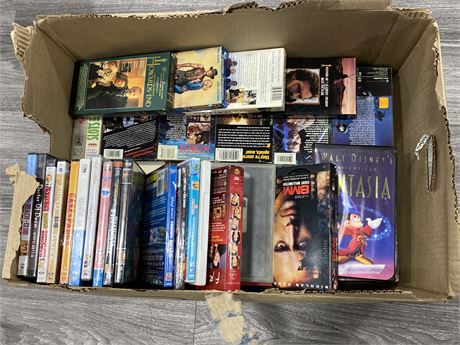 BOX OF VHS’ WITH SOME DVDS