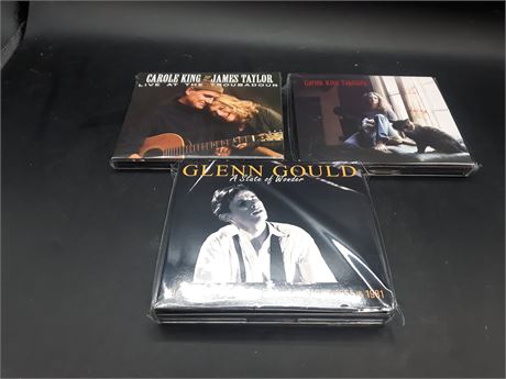 COLLECTION OF DELUXE EDITION MUSIC CDS - MINT CONDITION