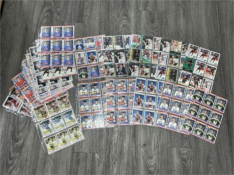 21 SHEETS OF NHL ROOKIE CARDS