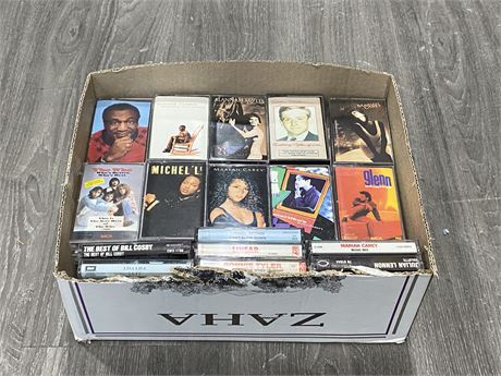 BOX OF 76 CASSETTES NEVER USED - GOOD TITLES