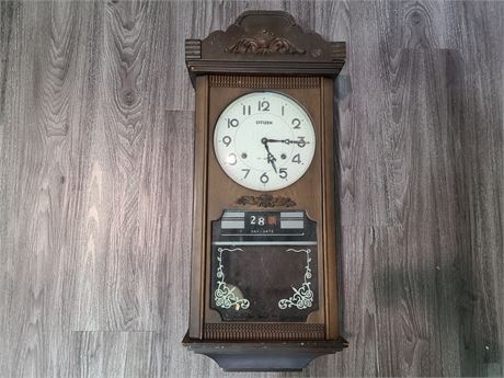 WALL  CLOCK WITH DATE FEATURE
