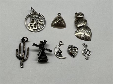8 STERLING CHARMS