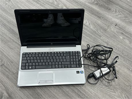 HP LAPTOP W/CORD - AS IS, DOES NOT CHARGE